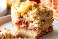 Irresistibly Soft Vegan Lemon Raspberry Coffee Cake with a Zesty Vegan Cream Cheese Swirl