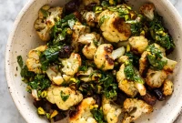 Zesty Pistachio Mint Gremolata over Roasted Garlic Cauliflower