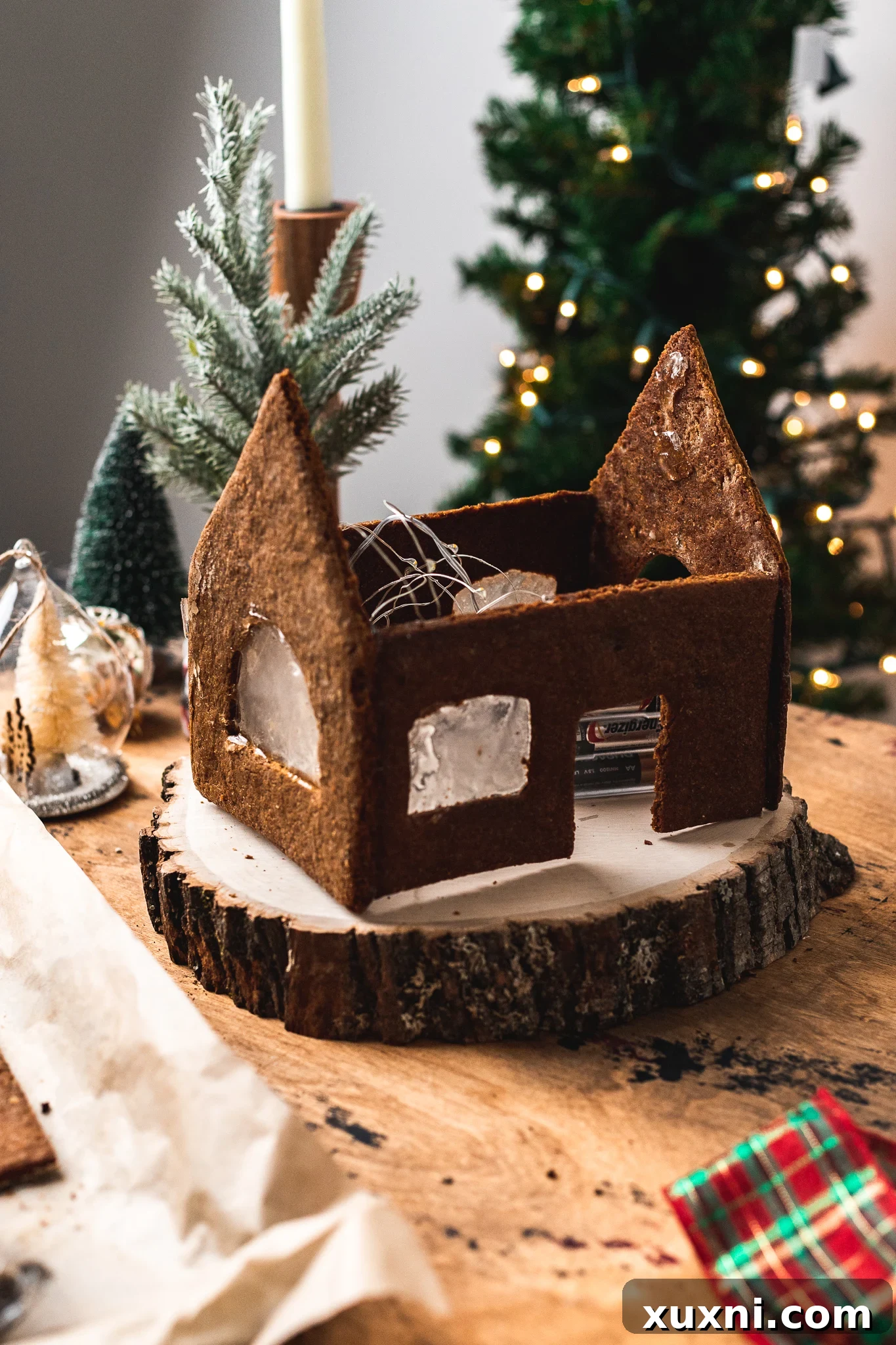 Partially assembled vegan gingerbread house structure without a roof, showing sturdy walls