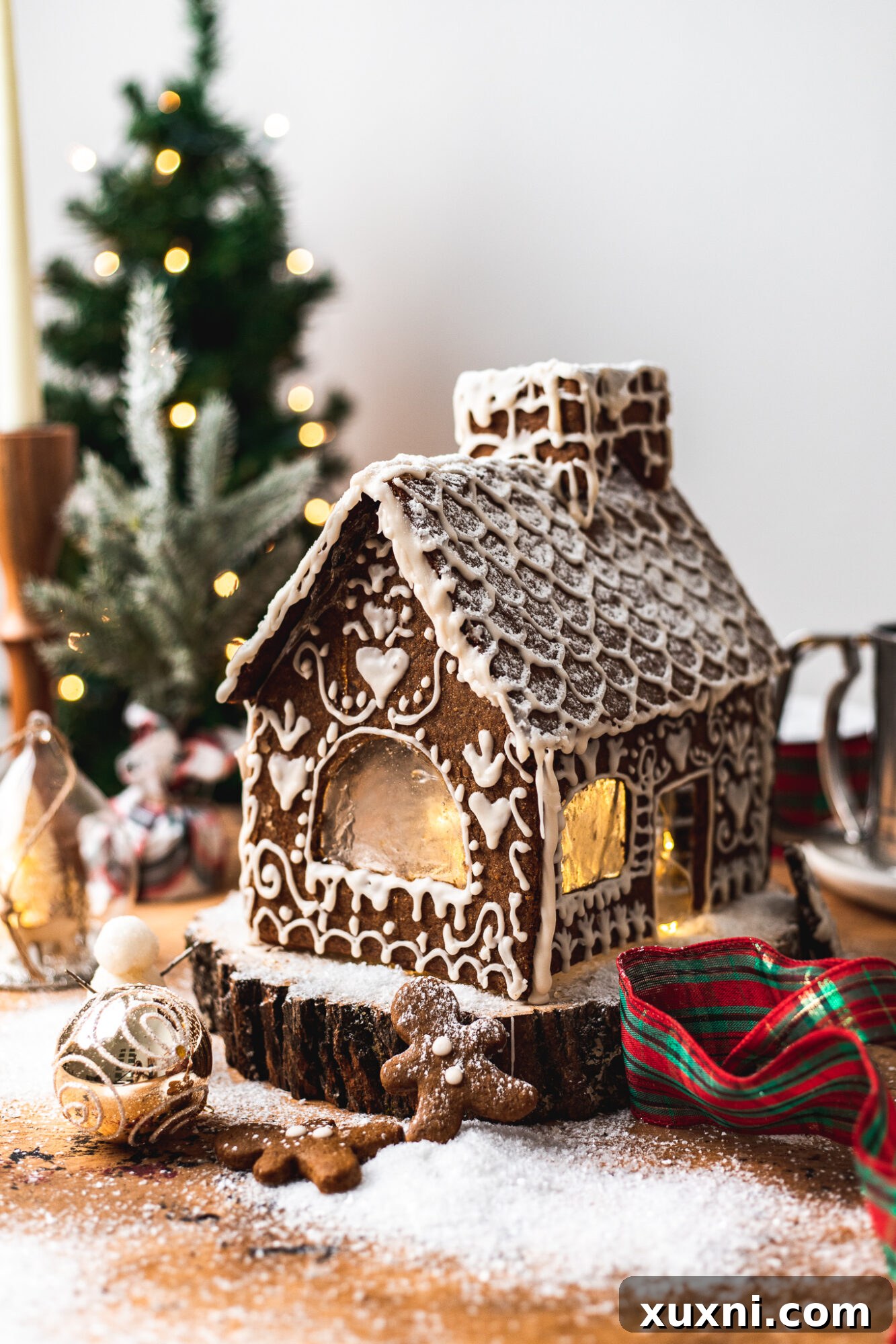Intricately decorated homemade vegan gingerbread house, ready for display