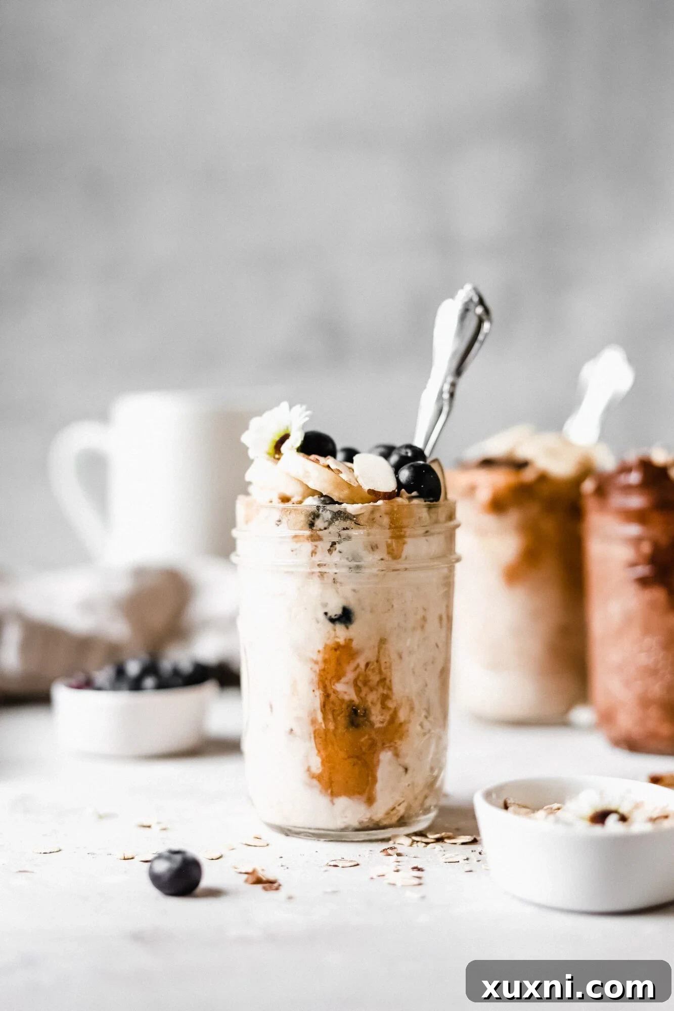 Jar of vibrant blueberry vanilla almond overnight oats