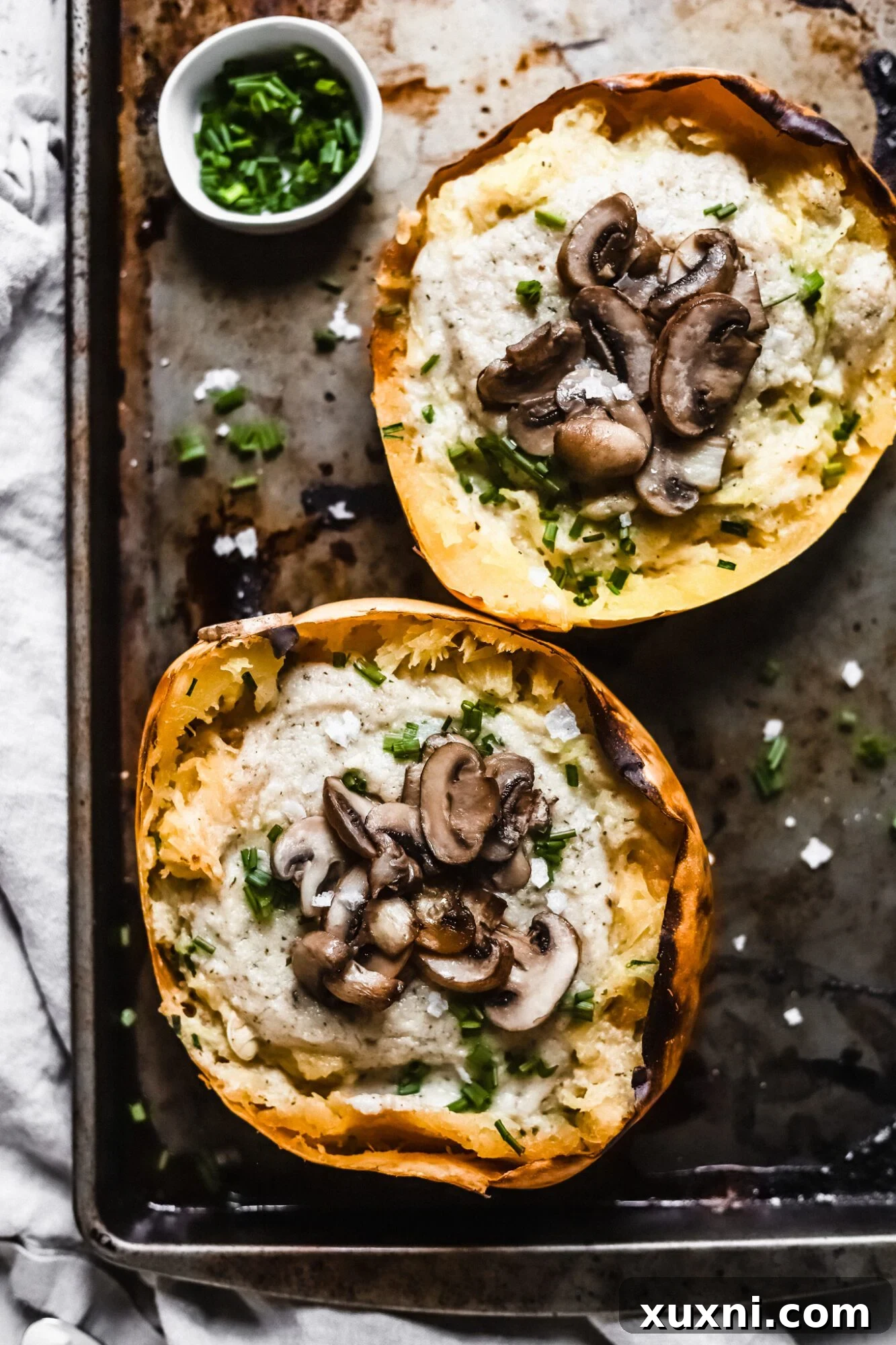 Two spaghetti squash boats arranged side by side, creating an inviting and wholesome meal presentation.