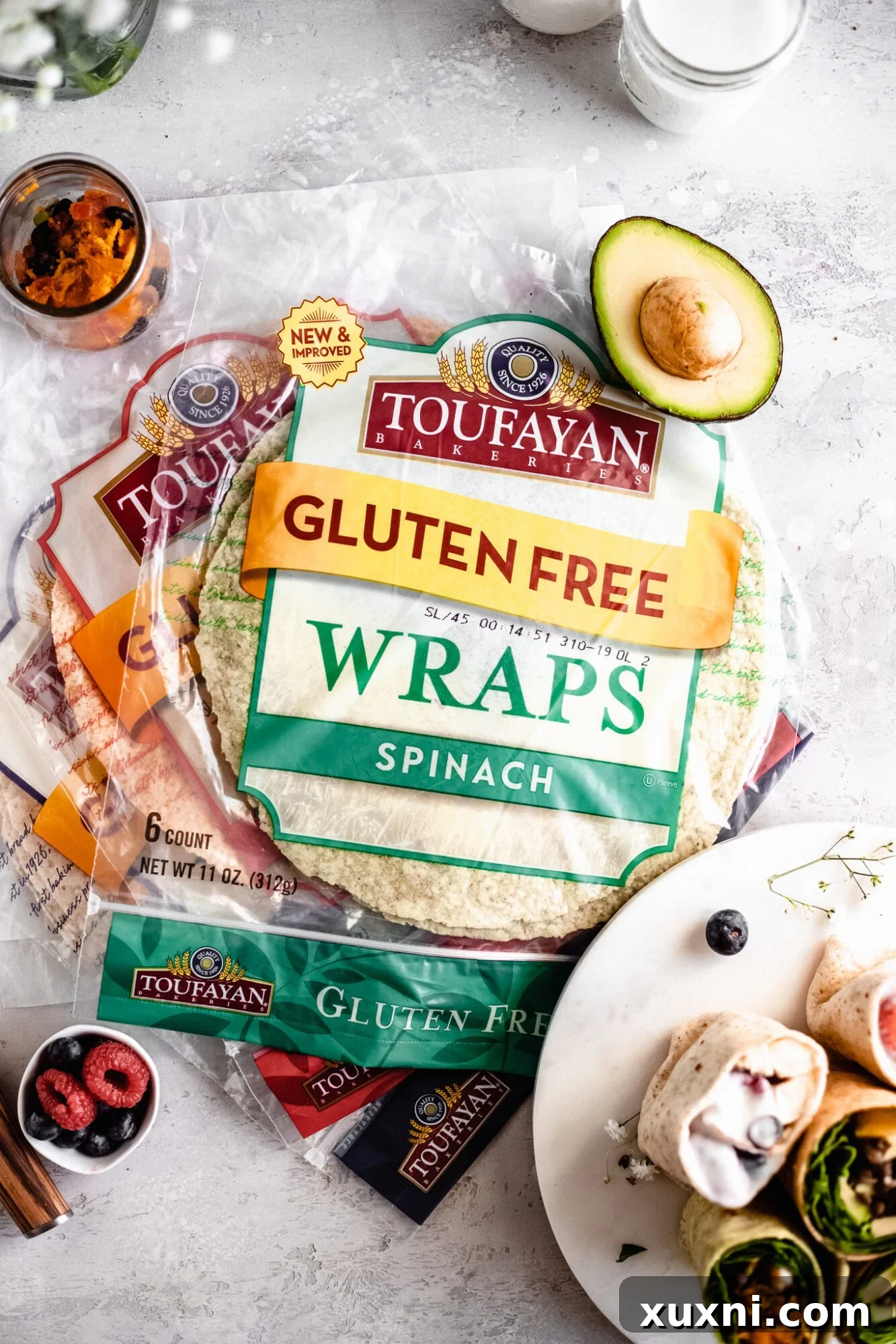 A stack of Toufayan gluten-free wraps, highlighting the product packaging