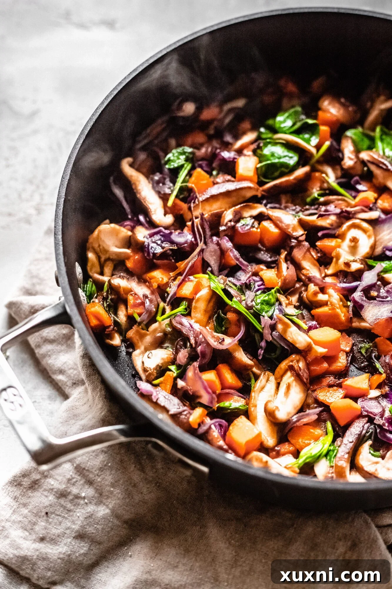 Effortless Keto Paleo Vegan Lo Mein Stir-Fry 9 sauteed stir frey veggies in skillet