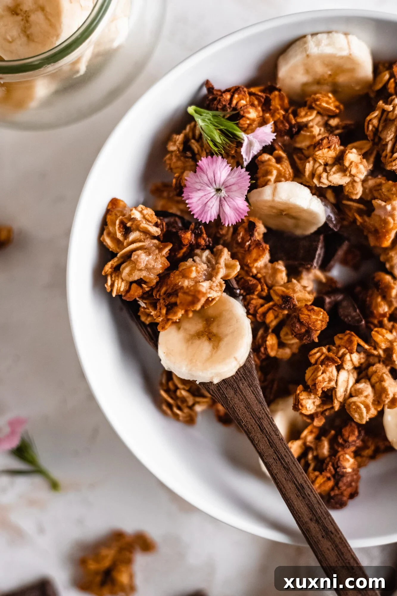 An enticing close-up of golden-brown granola clusters, perfectly baked and ready for a satisfying crunch.