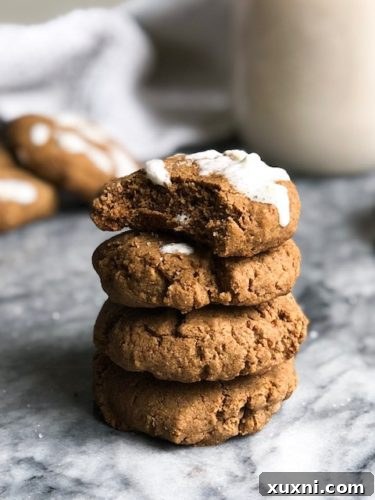 Soft gingerbread cookies that are just the right amount of spicy, sweetened with maple syrup, and completely gluten-free! They're the perfect addition to any cookie exchange or festive holiday party!