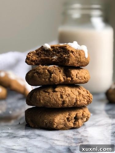Soft gingerbread cookies that are just the right amount of spicy, sweetened with maple syrup, and completely gluten-free! They're the perfect addition to any cookie exchange or festive holiday party!