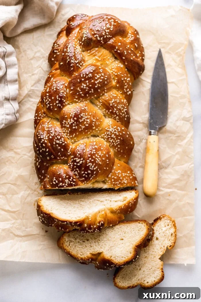sliced vegan challah bread on a cutting board