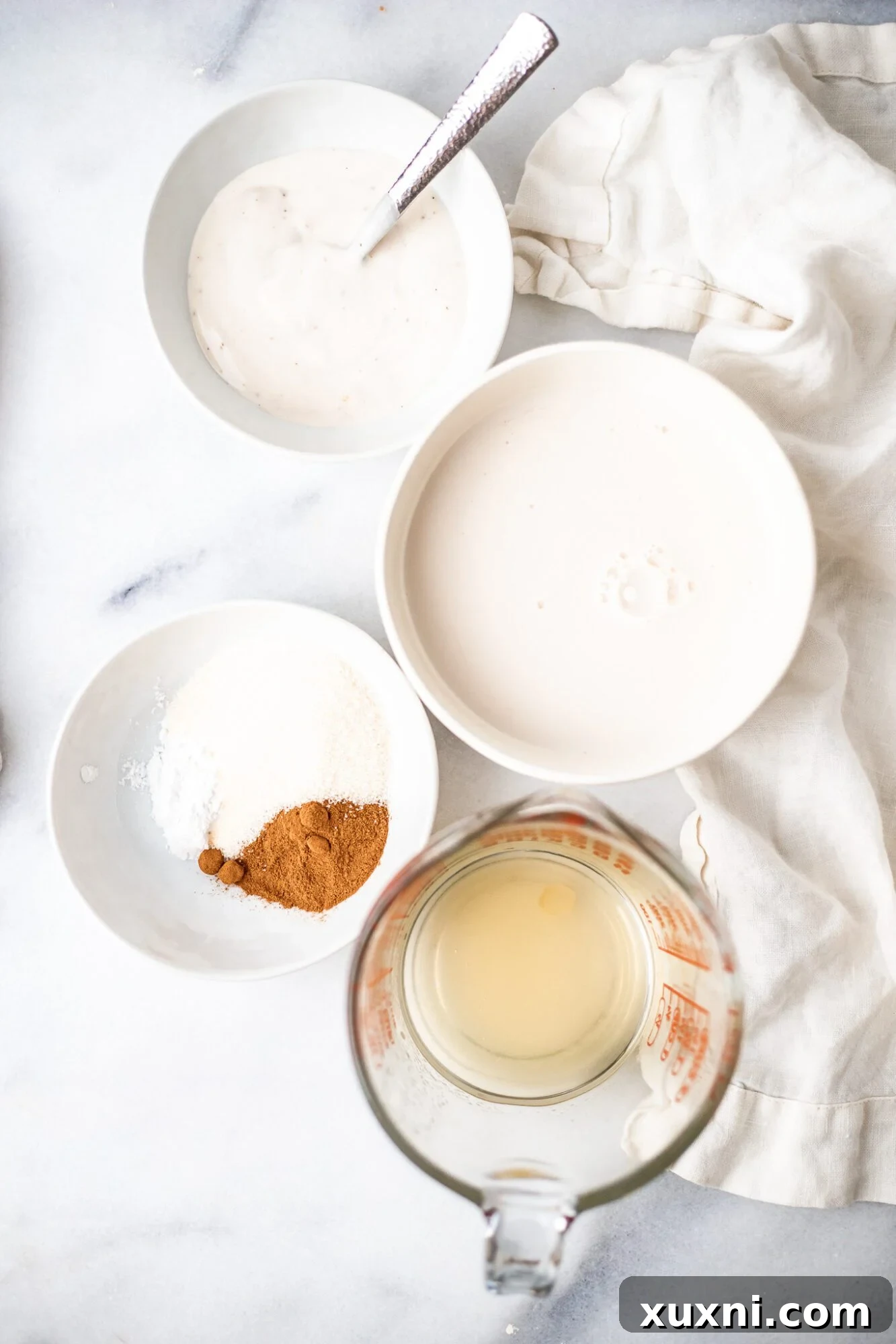 vegan French toast ingredients on marble.