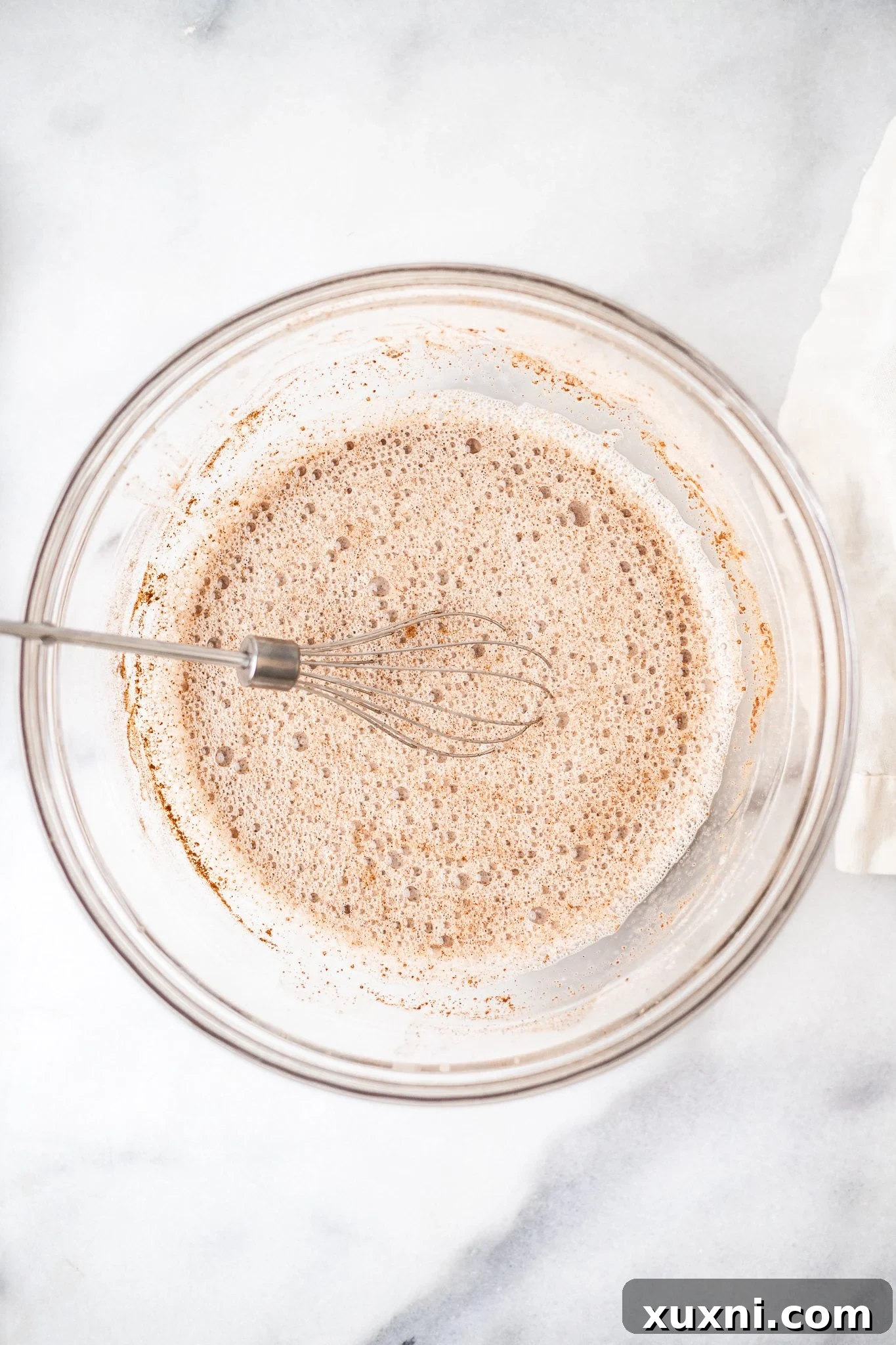 whisk in bowl of French toast batter before the bread is being dipped into it.