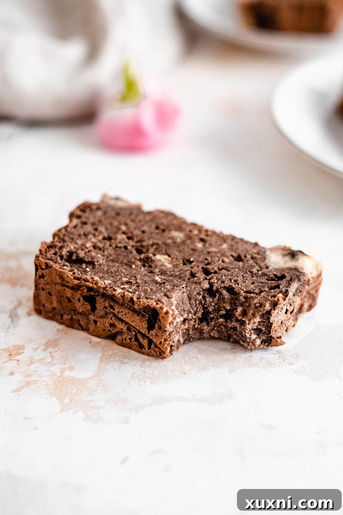 Effortless One-Bowl Vegan Gluten-Free Banana Bread 12 bite taken from buckwheat banana bread slice