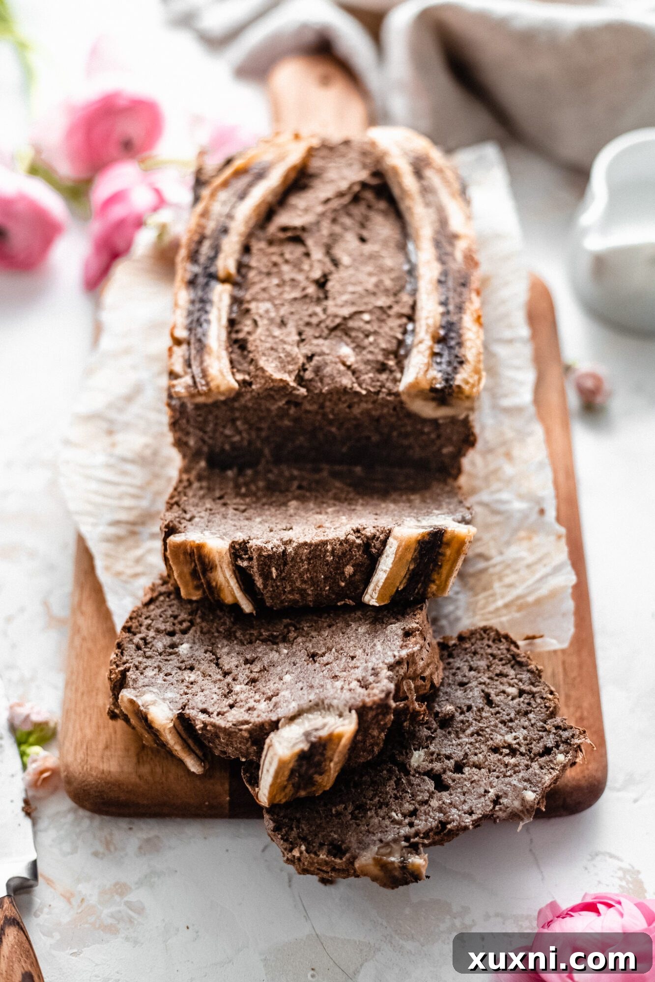 Effortless One-Bowl Vegan Gluten-Free Banana Bread 3 sliced vegan banana bread showing moist texture