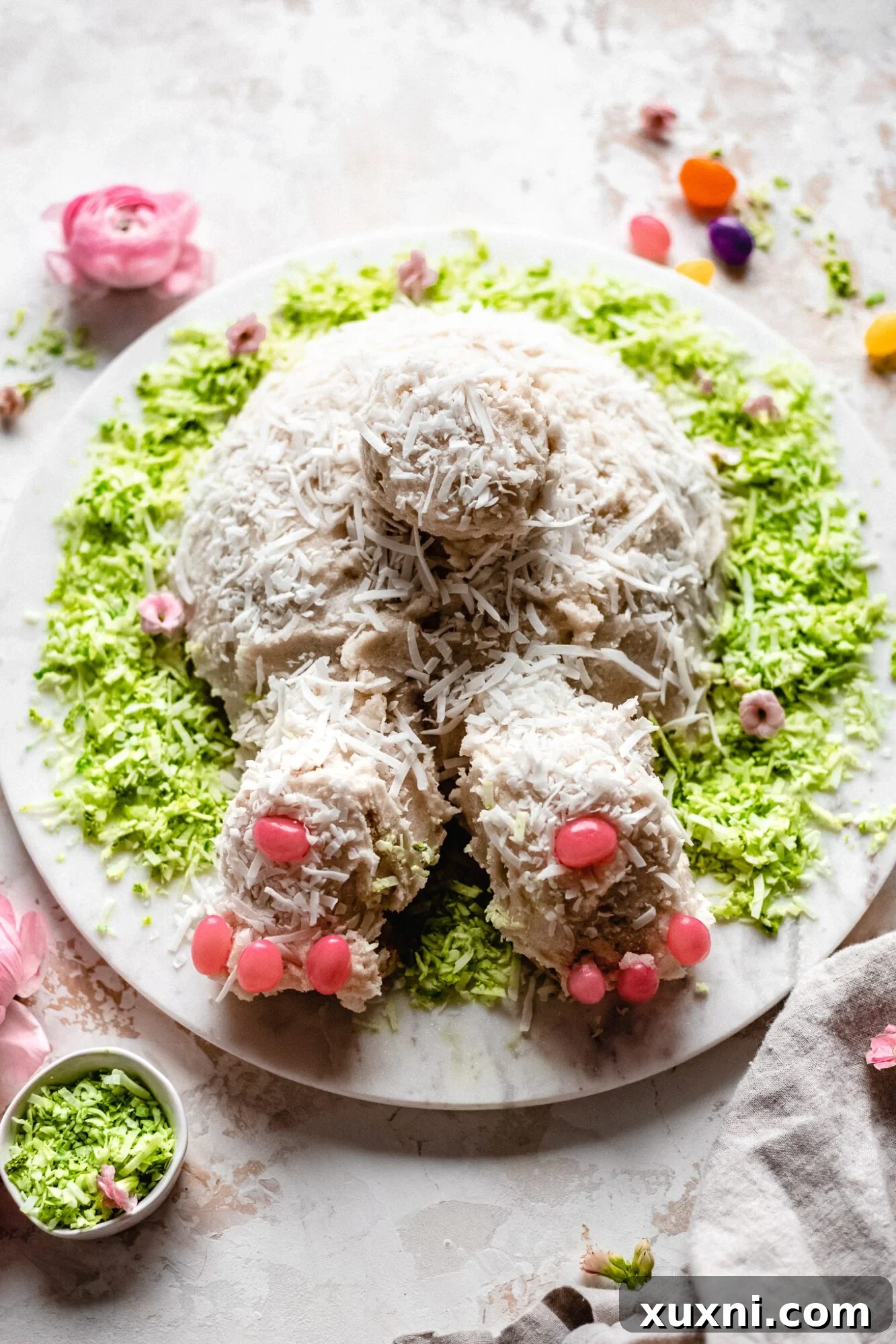 Close-up of a beautifully decorated vegan bunny butt cake, showcasing its charming details and festive appeal