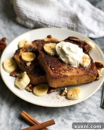 Challah French toast that's sweet, doughy, and full of cinnamon flavor! A recipe passed down for a few generations, this French toast is the perfect weekend or holiday morning start!