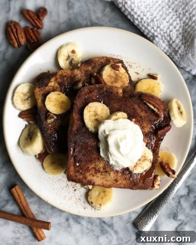 Challah French toast that's sweet, doughy, and full of cinnamon flavor! A recipe passed down for a few generations, this French toast is the perfect weekend or holiday morning start!