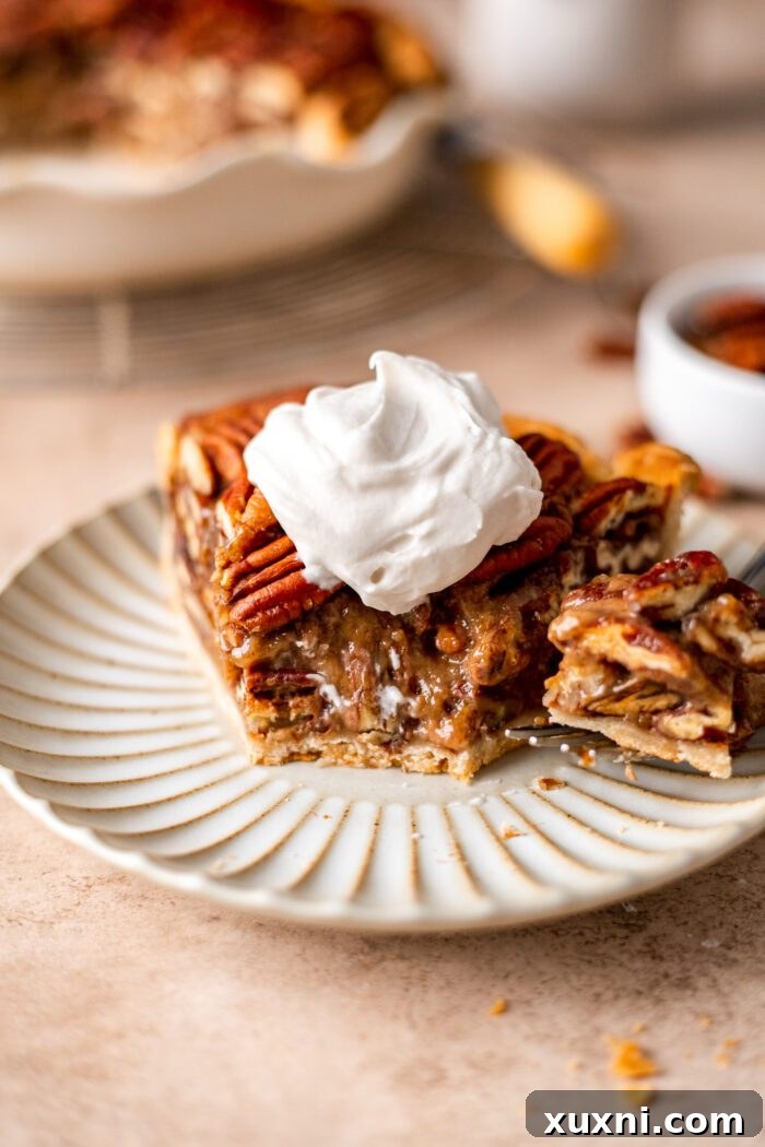 slice of vegan pecan pie with bite taken