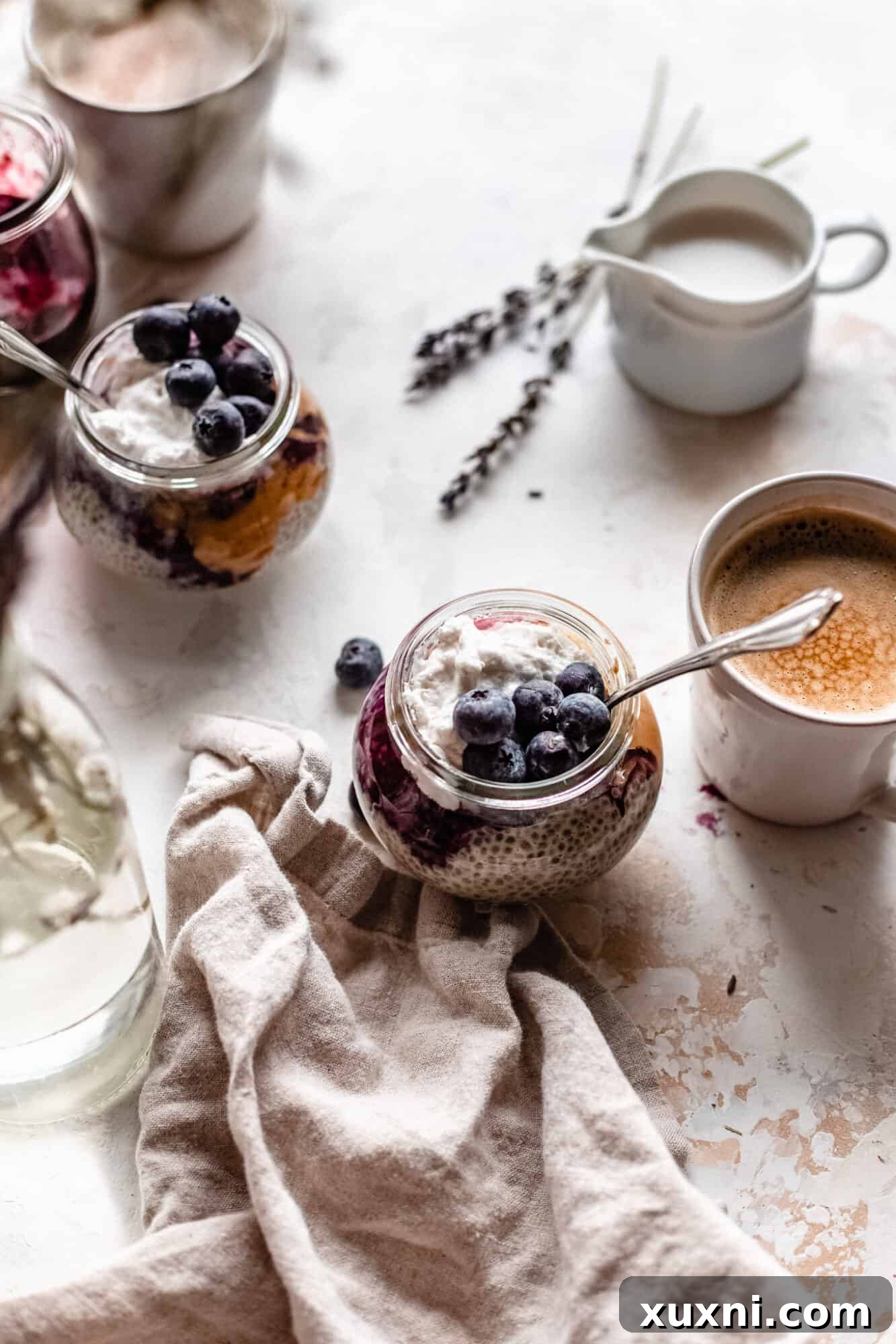 Dreamy Overnight Peanut Butter and Jelly Chia Pudding Vegan 4 jars of chia pudding and coffee