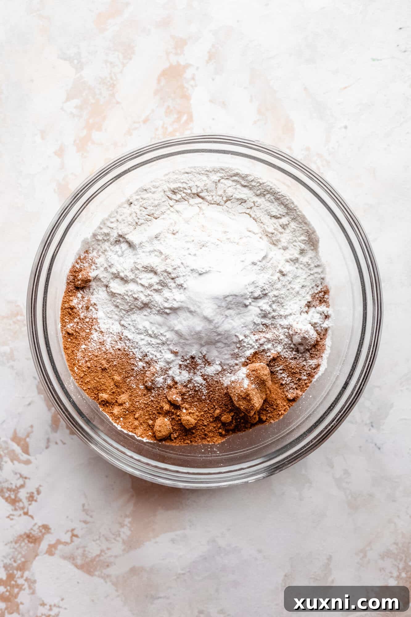 Dry ingredients in a bowl, awaiting combination.
