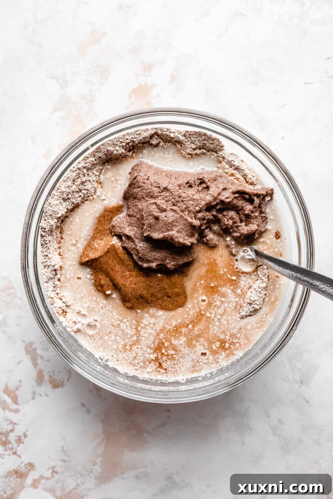 Wet ingredients gathered in a separate bowl.