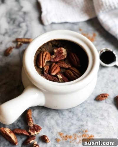 Single-serving Gingerbread Baked Oatmeal that's filled with plant-based protein for a filling and festive breakfast! These oats are perfectly spicy and sweetened with natural sugars.