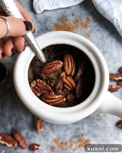 Single-serving Gingerbread Baked Oatmeal that's filled with plant-based protein for a filling and festive breakfast! These oats are perfectly spicy and sweetened with natural sugars.