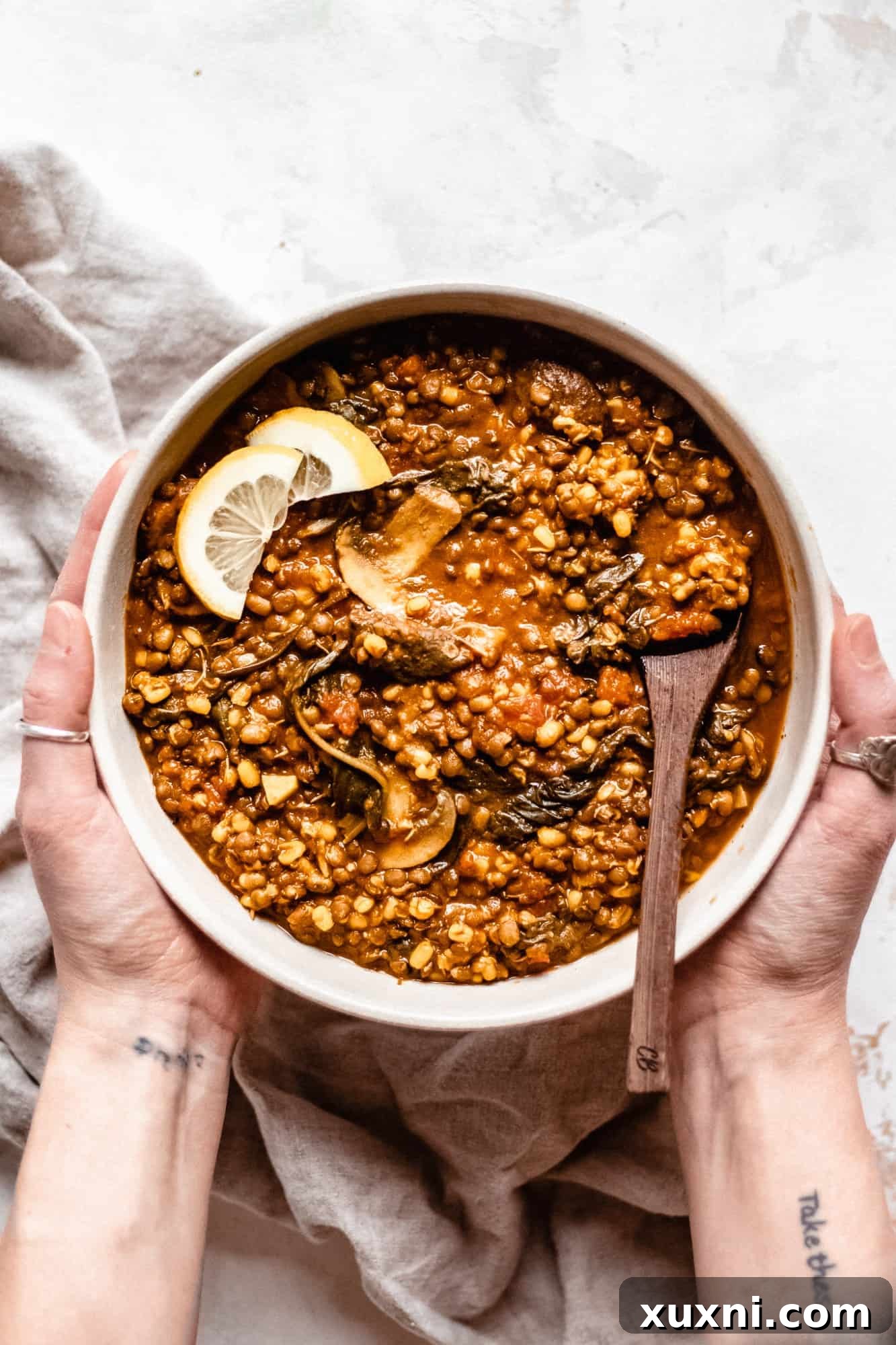 A hearty bowl of vegan lentil soup, an ideal easy pantry meal, rich in protein.