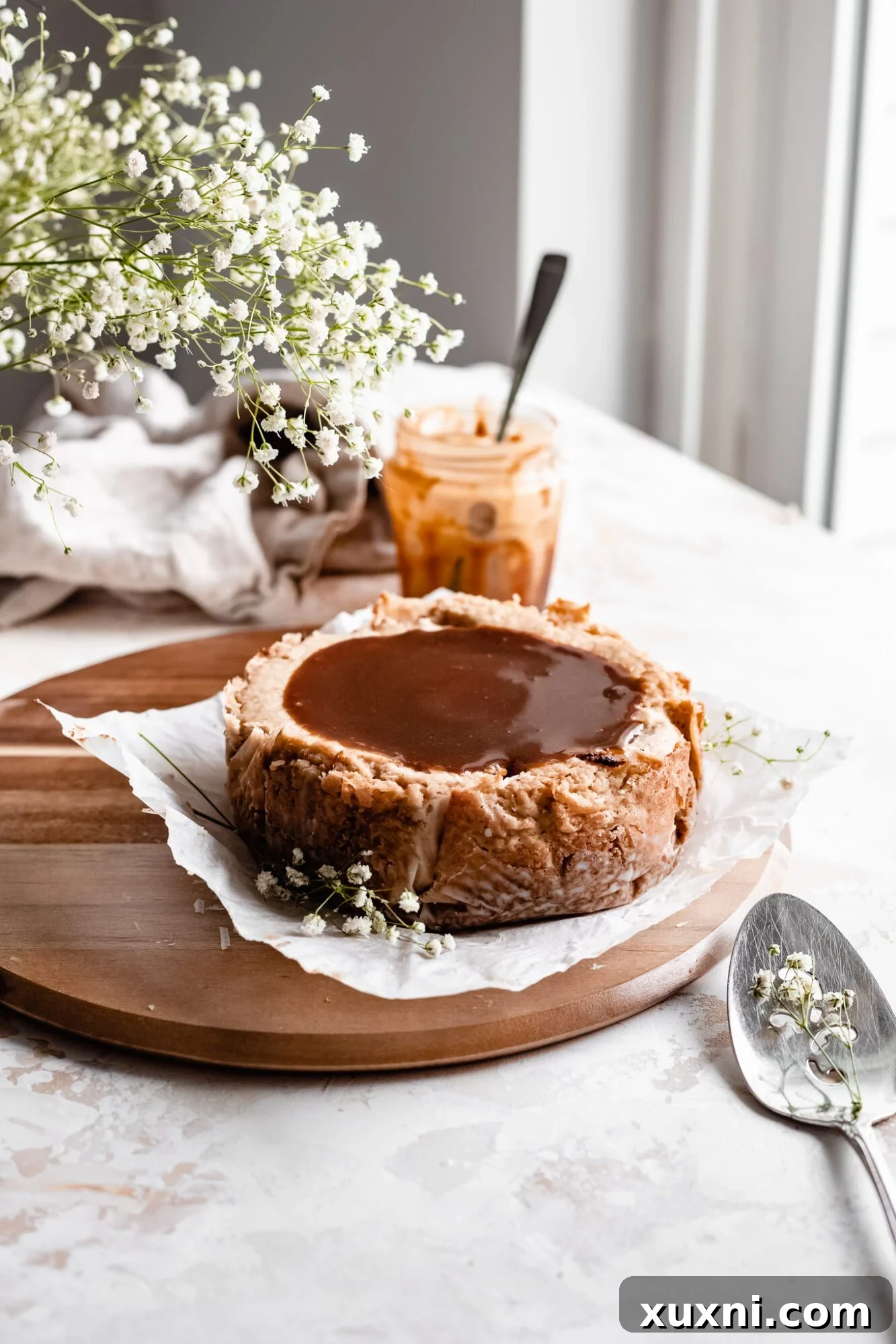 whole instant pot cheesecake on wooden board