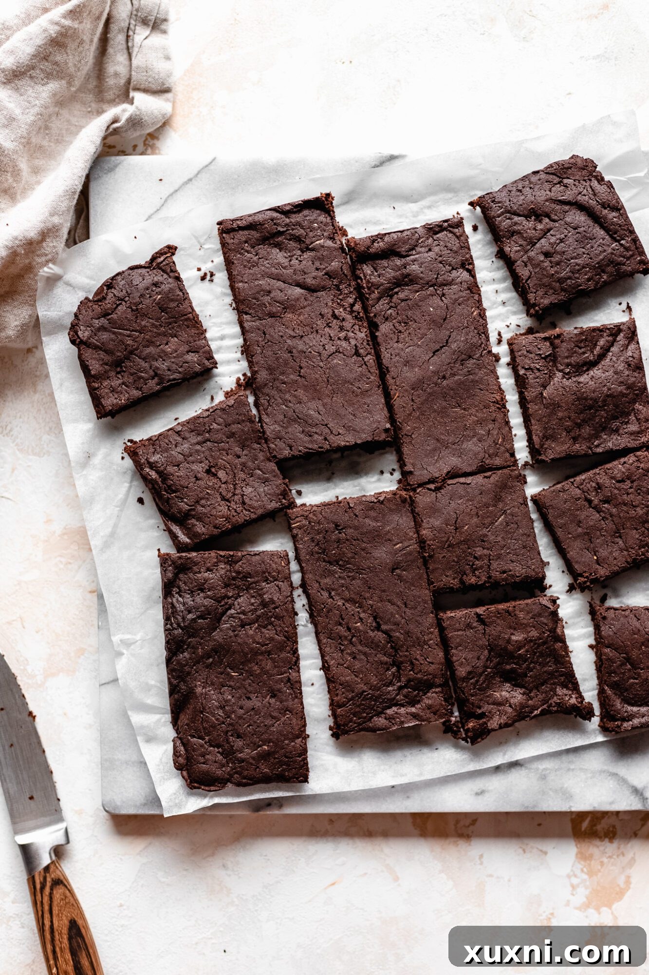 Decadent Paleo Vegan Zucchini Brownies 6 Close up of fudgy sliced zucchini brownies