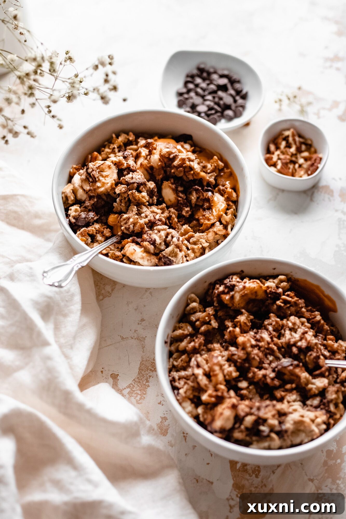 Instant Pot Protein Packed Vegan Zucchini Oatmeal 14 bowls of zucchini oatmeal with mixed toppings like peanut butter and chocolate chips