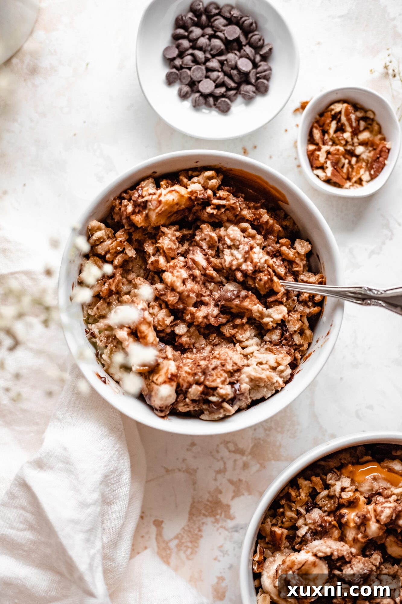 Instant Pot Protein Packed Vegan Zucchini Oatmeal 17 bowl of zucchini oatmeal with all toppings mixed in, ready to eat