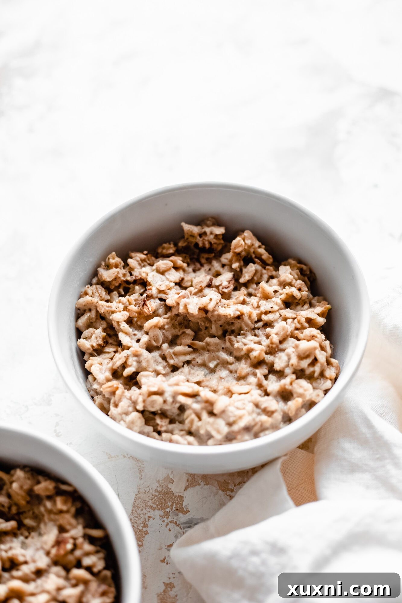 Instant Pot Protein Packed Vegan Zucchini Oatmeal 5 bowl of un-topped zucchini oatmeal, showing its creamy texture