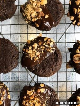 Paleo vegan flourless chocolate hazelnut cookies that are every bit as delicious as a spoonful of Nutella and made with 6 real and simple ingredients!