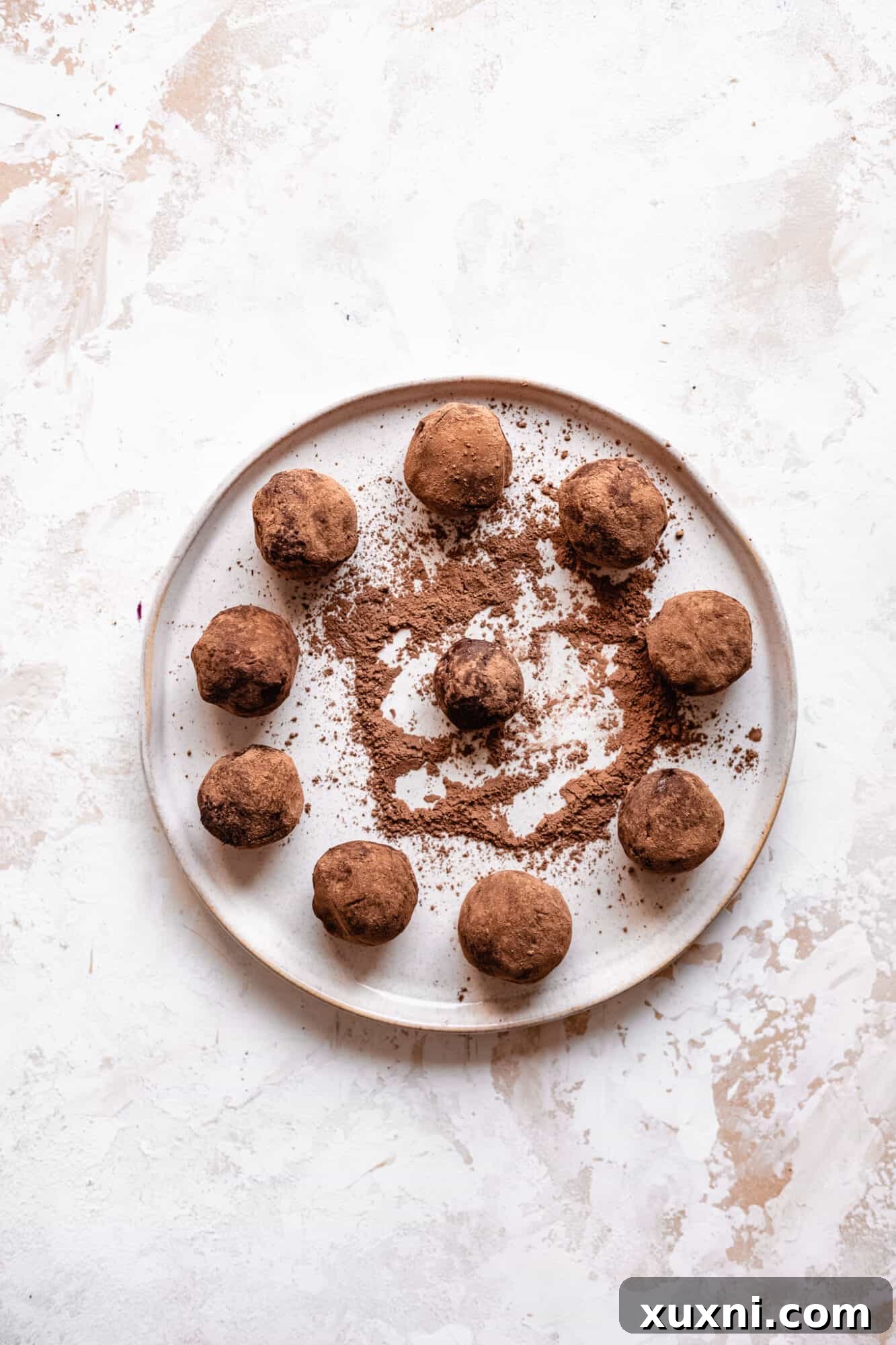 chocolate truffles rolled on plate