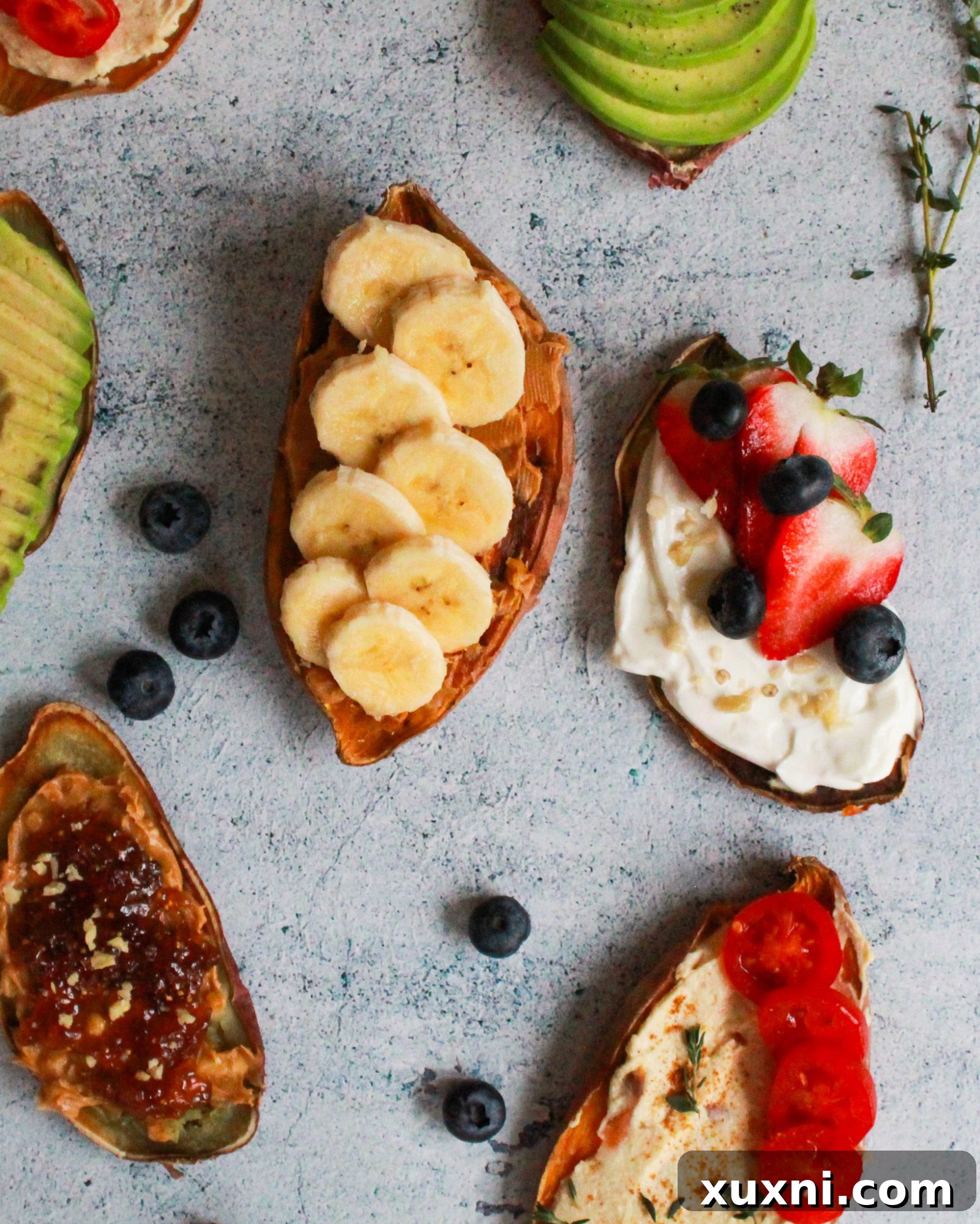Sweet Potato Toast Reinvented: 5 Vegan Recipes 5 Sweet potato toast with creamy nut butter and warm berry compote, garnished with fresh berries.