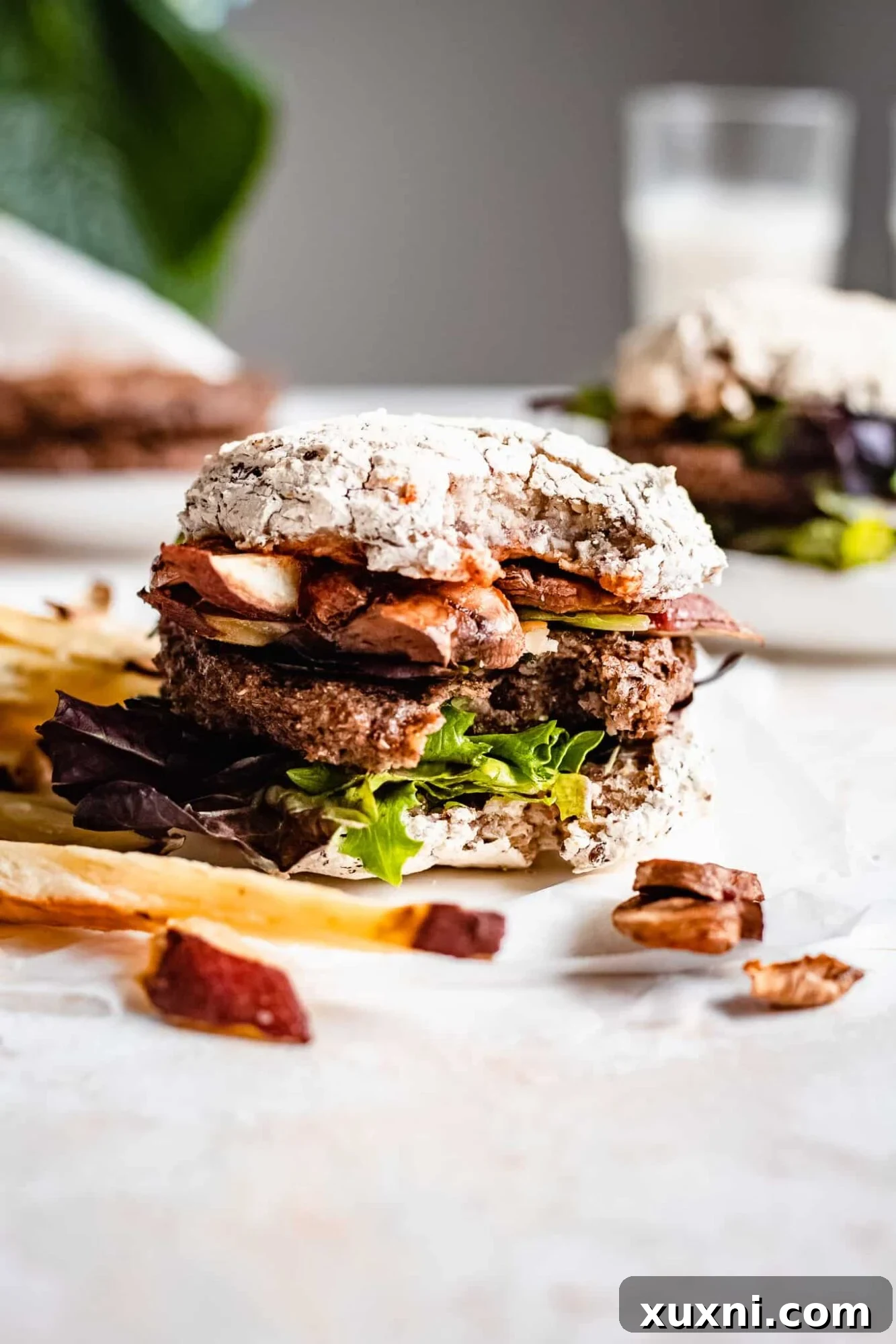 A delectable vegan veggie burger with a bite taken, showing the perfect texture and juicy interior.