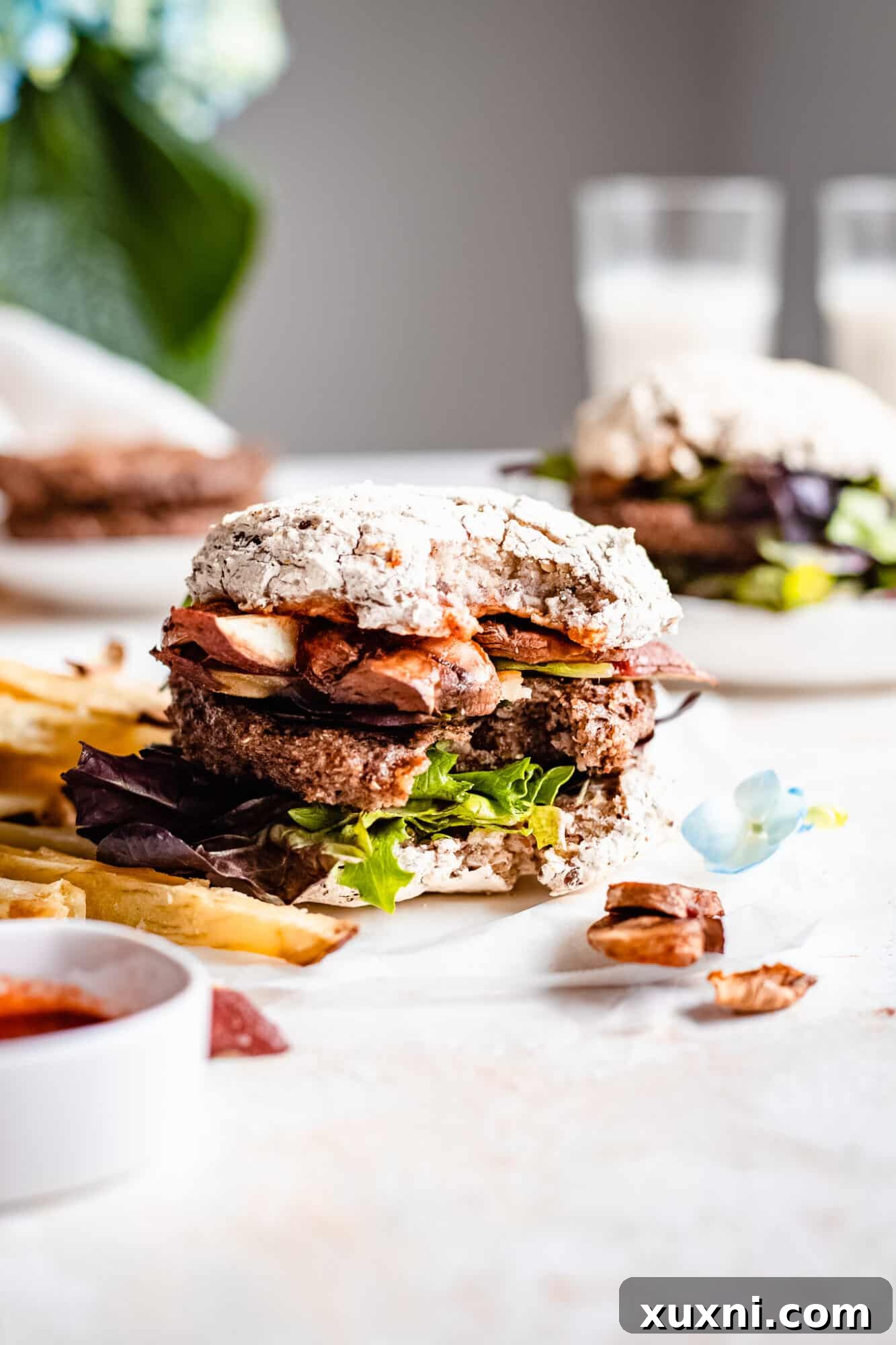 A delicious vegan quinoa burger, made with perfectly cooked Instant Pot quinoa, served on a bun.