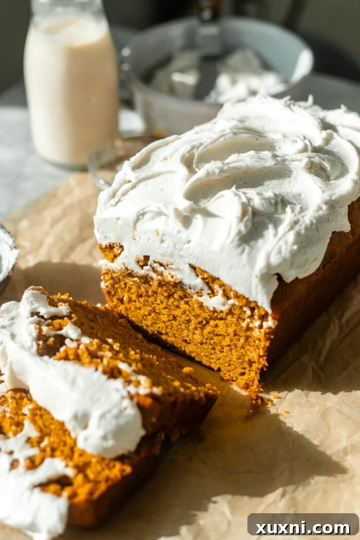 Incredibly Moist Vegan Pumpkin Bread Effortless One-Bowl Recipe 14 A stack of perfectly baked vegan pumpkin bread slices, ready for serving or enjoyment.