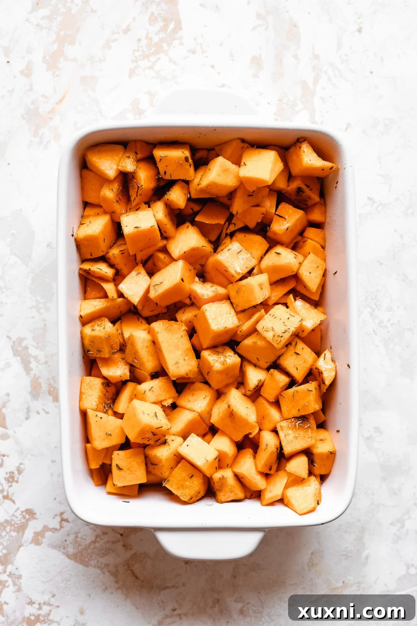 Effortless Golden Roasted Butternut Squash 6 Raw, unpeeled butternut squash cubes, perfectly prepared for roasting