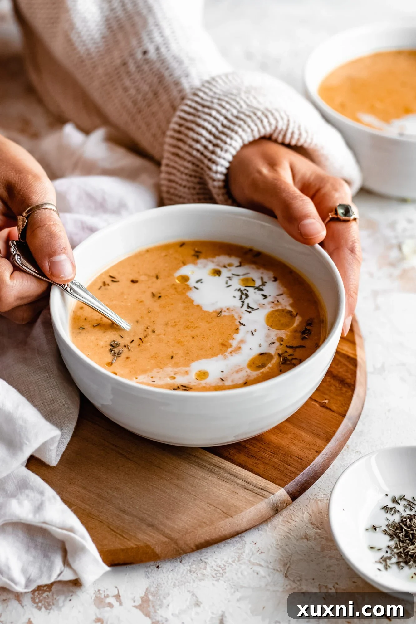 Effortless Golden Roasted Butternut Squash 8 A cozy bowl of creamy roasted butternut squash soup, garnished and ready to be enjoyed