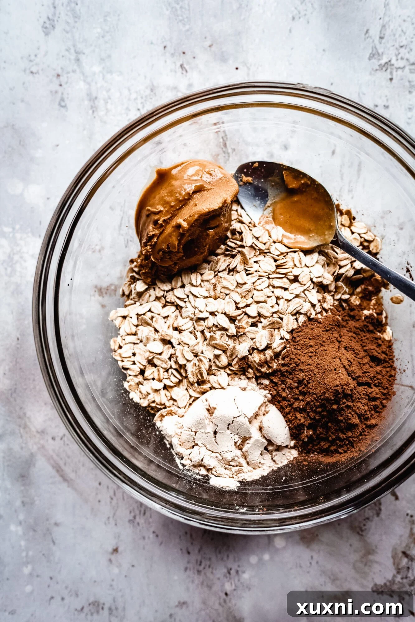 bowl of homemade healthy granola ingredients