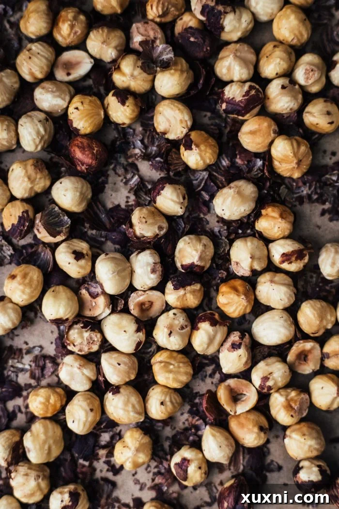 Close-up of roasted hazelnuts, ready for making vegan Nutella.