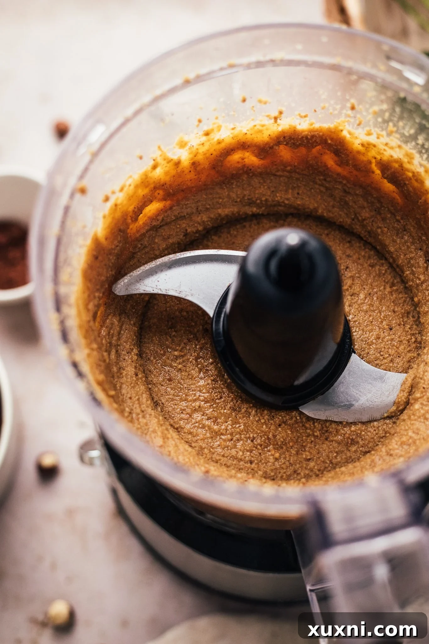 Smooth vegan hazelnut butter in a food processor, before adding chocolate.