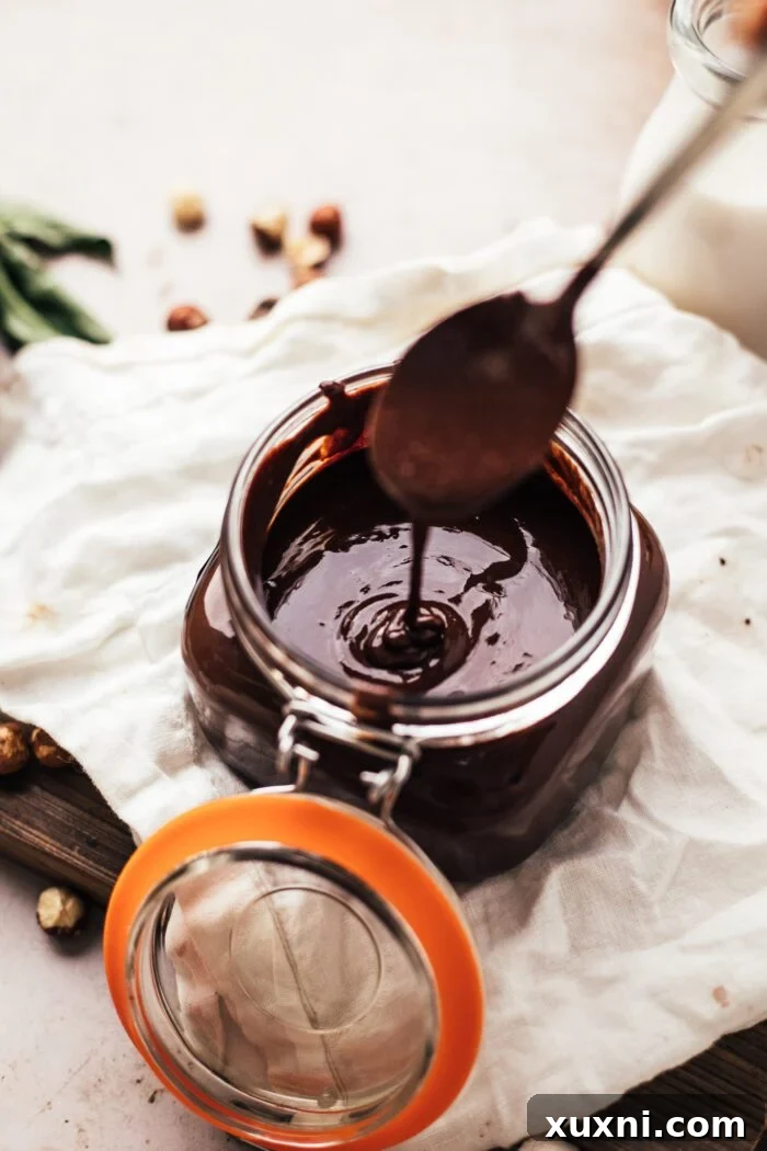 A beautifully presented jar of homemade vegan Nutella, ready to be enjoyed.