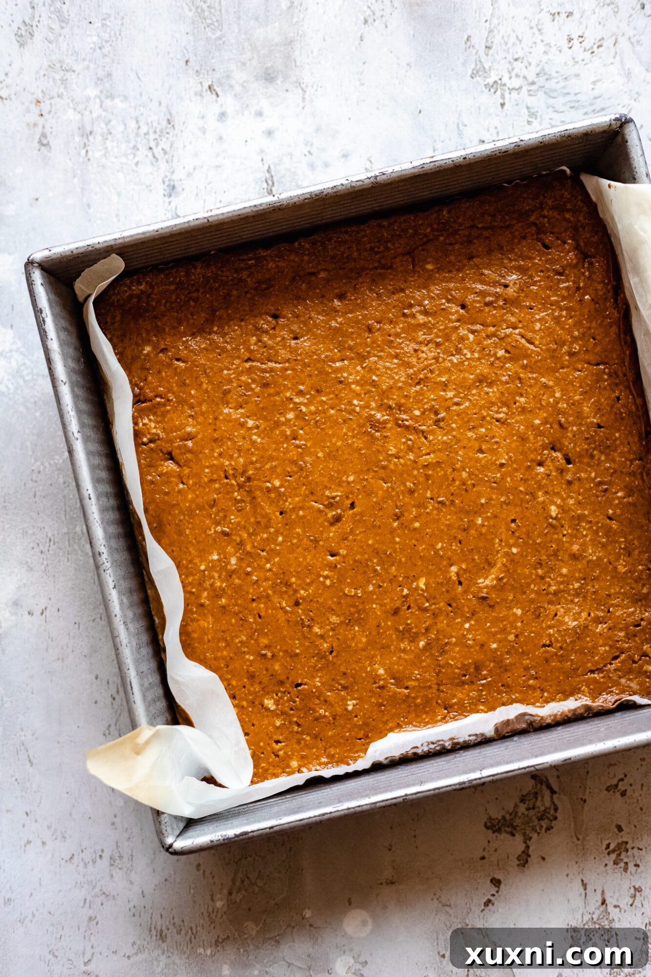 Chilled pumpkin bars, after 4-6 hours of refrigeration, showcasing a perfectly firm and set texture.