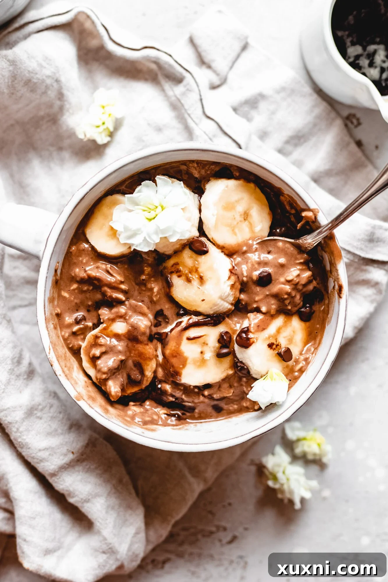 mixed bowl of overnight oats with spoon