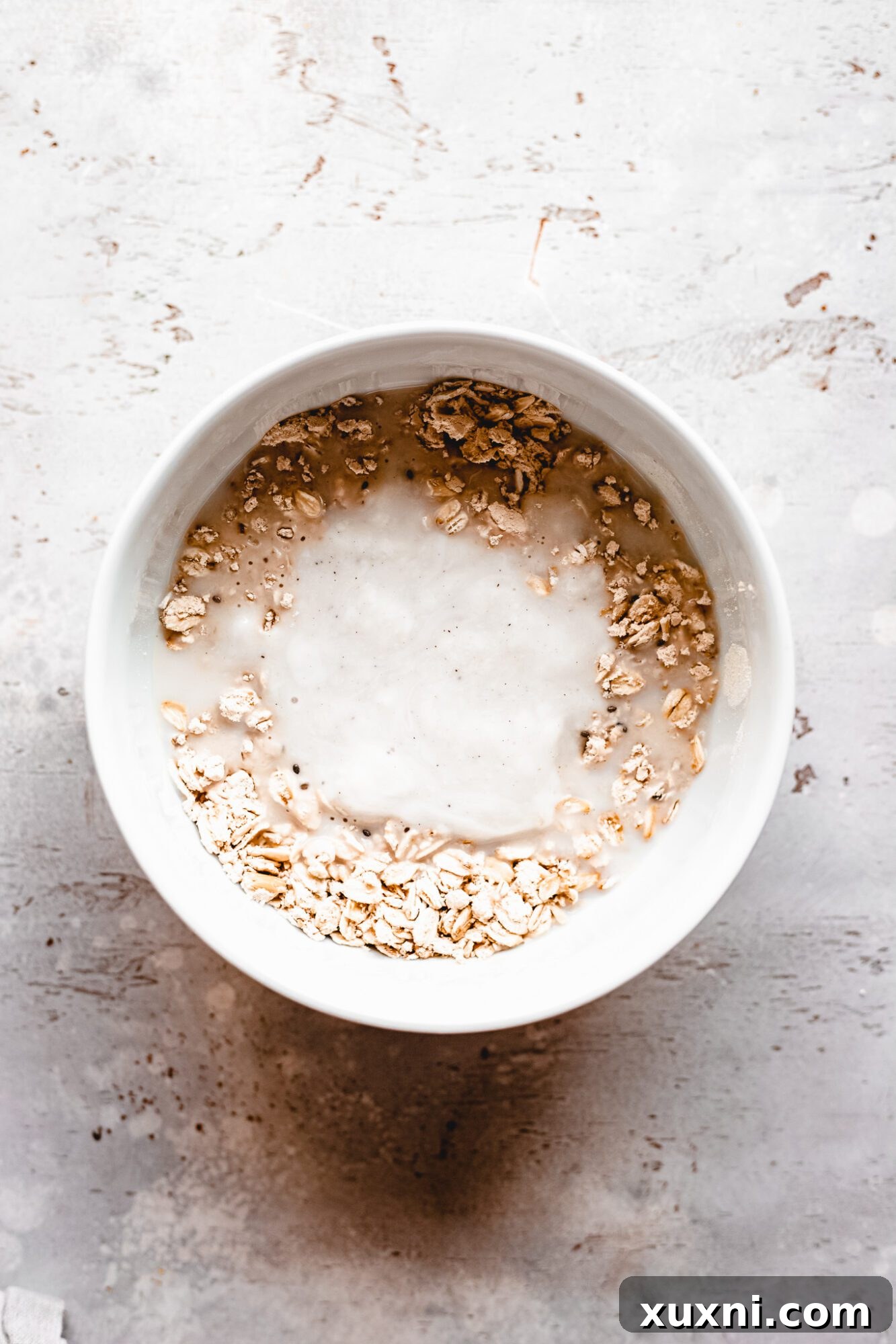 dry ingredients with wet ingredients being added