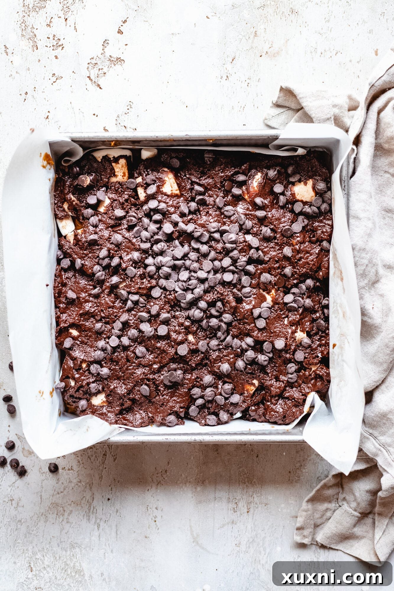 Vegan Smores Brownie Cookie Recipe 10 vegan brownie batter spread evenly over the marshmallow layer in a pan