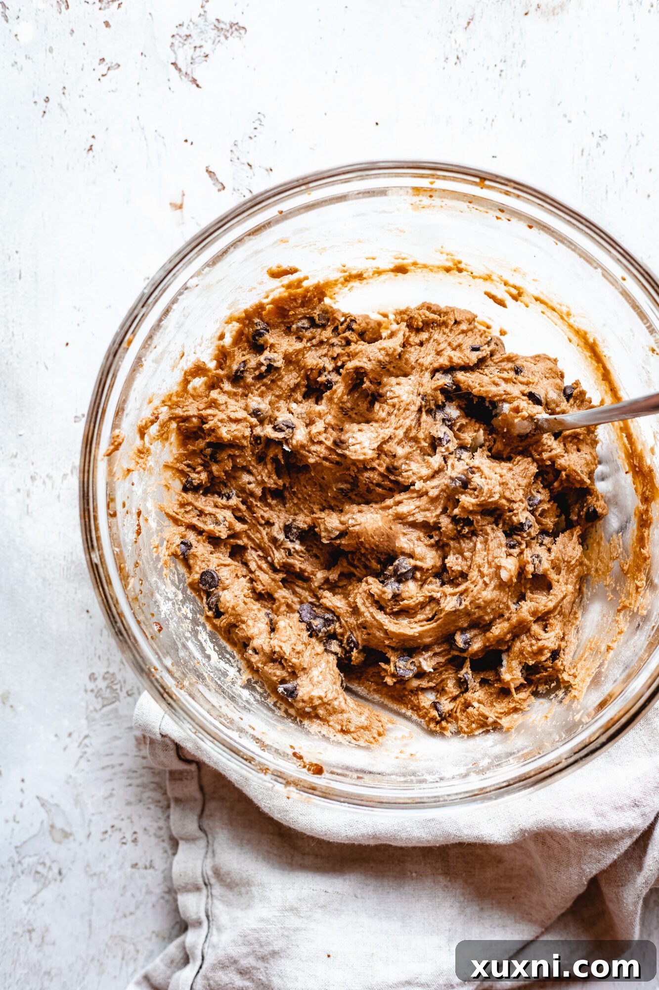 Vegan Smores Brownie Cookie Recipe 6 close up of vegan chocolate chip cookie dough in a mixing bowl