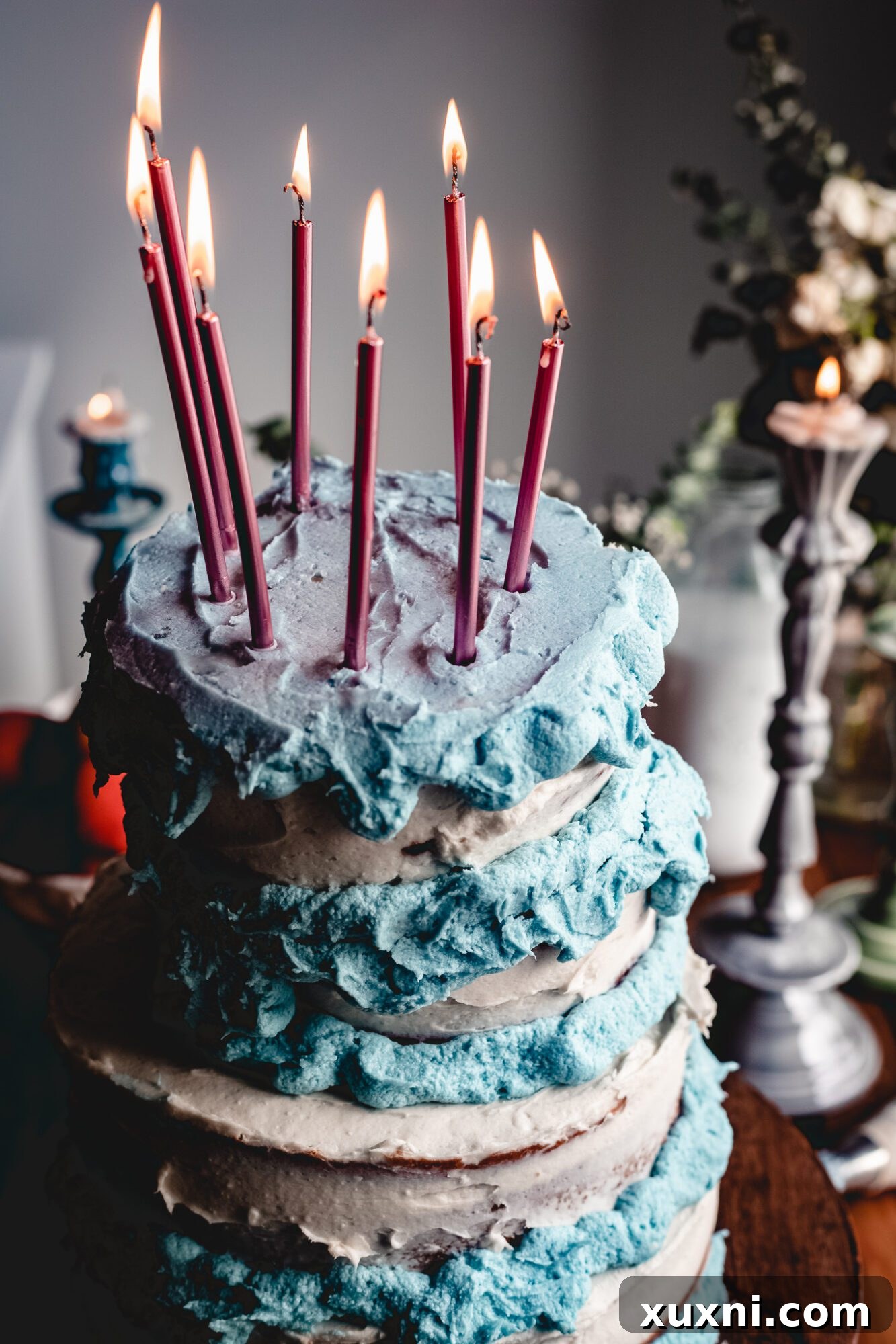 The enchanting Sleeping Beauty cake adorned with vibrant pink candles, ready to bring fairytale magic to any celebration.