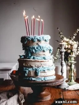 vegan sleeping beauty cake with blue icing drips